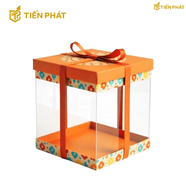 Hộp bánh kem trong suốt, màu cam, họa tiết các bông hoa nhỏ