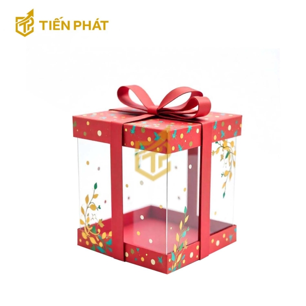 Hộp bánh kem trong suốt, màu đỏ, họa tiết chấm tròn và lá cây