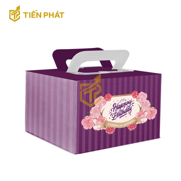 Hôp bánh kem vuông màu tím, in hình bông hoa và chữ "Happy Birthday"