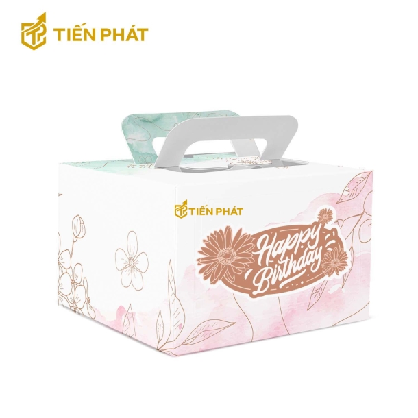 Hộp bánh kem vuông, màu trắng - hồng - xanh, in hình hoa và lá, in chữ "Happy Birthday"