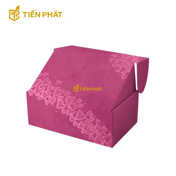 Hộp giấy đựng quần áo màu hồng, họa tiết nhiều trái tim nhỏ