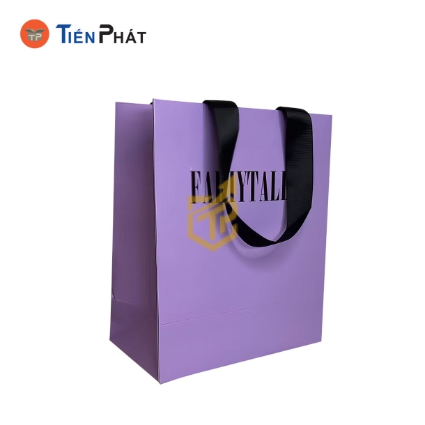 Túi giấy đựng quần áo màu tím, in logo theo yêu cầu